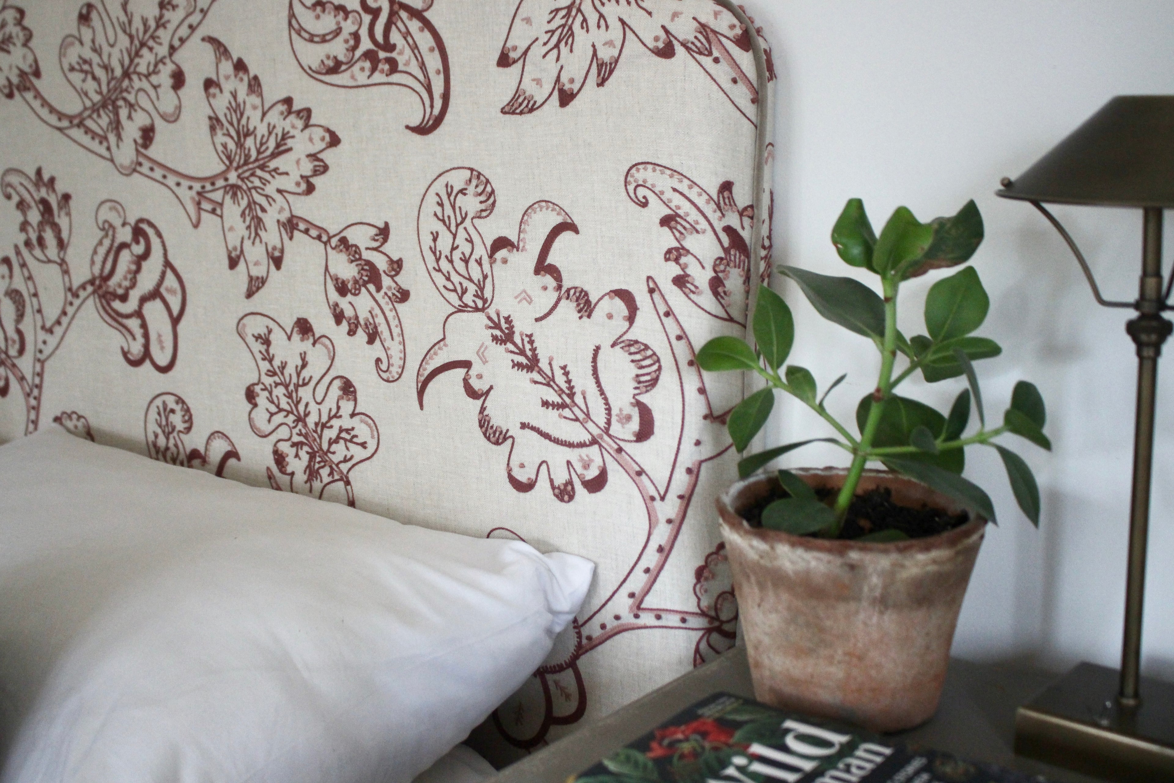 Close-up of James Hare Arboreal botanical print on handmade Pippa headboard