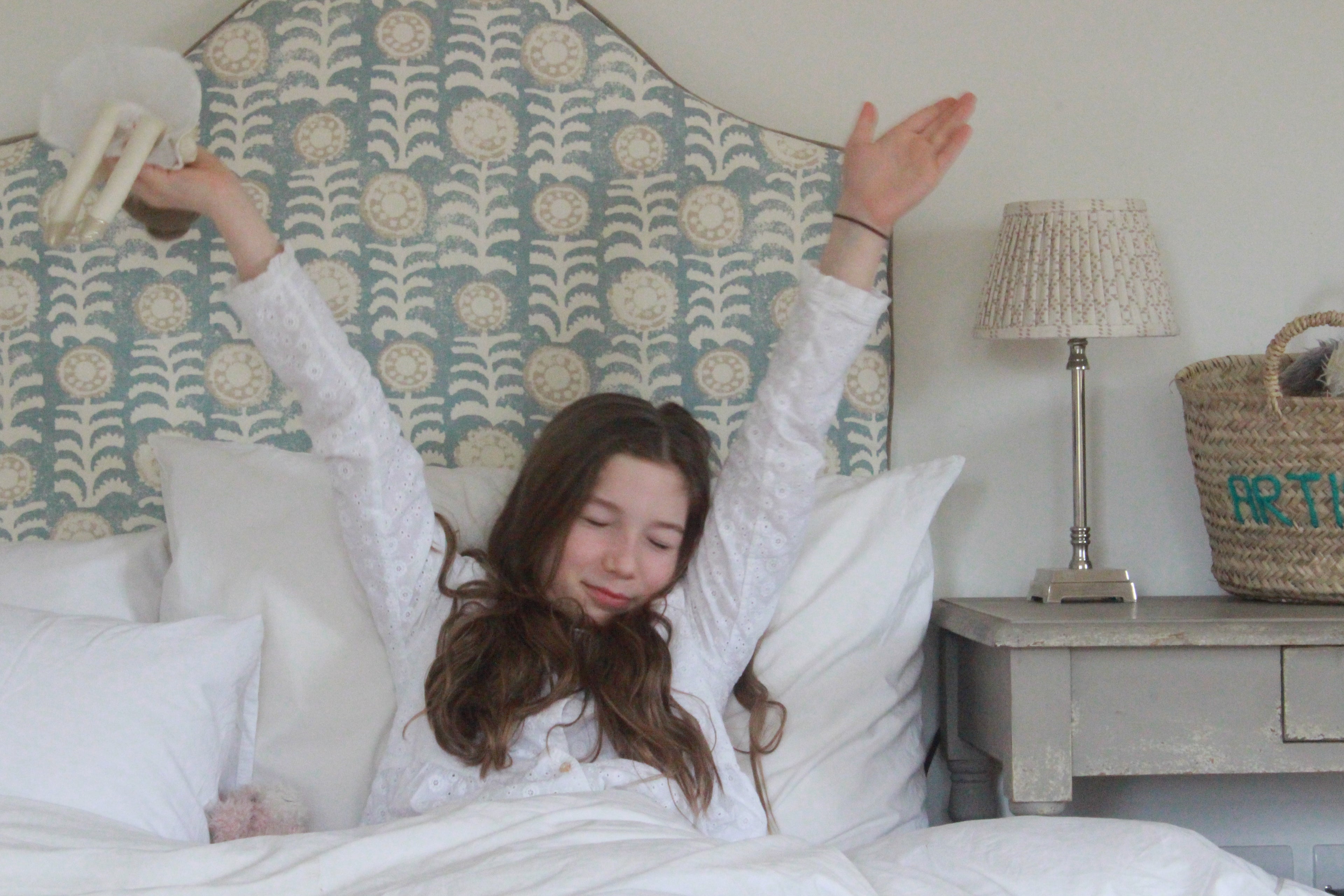 Close-up of Penny Morrison designer fabric on handmade Margot single headboard