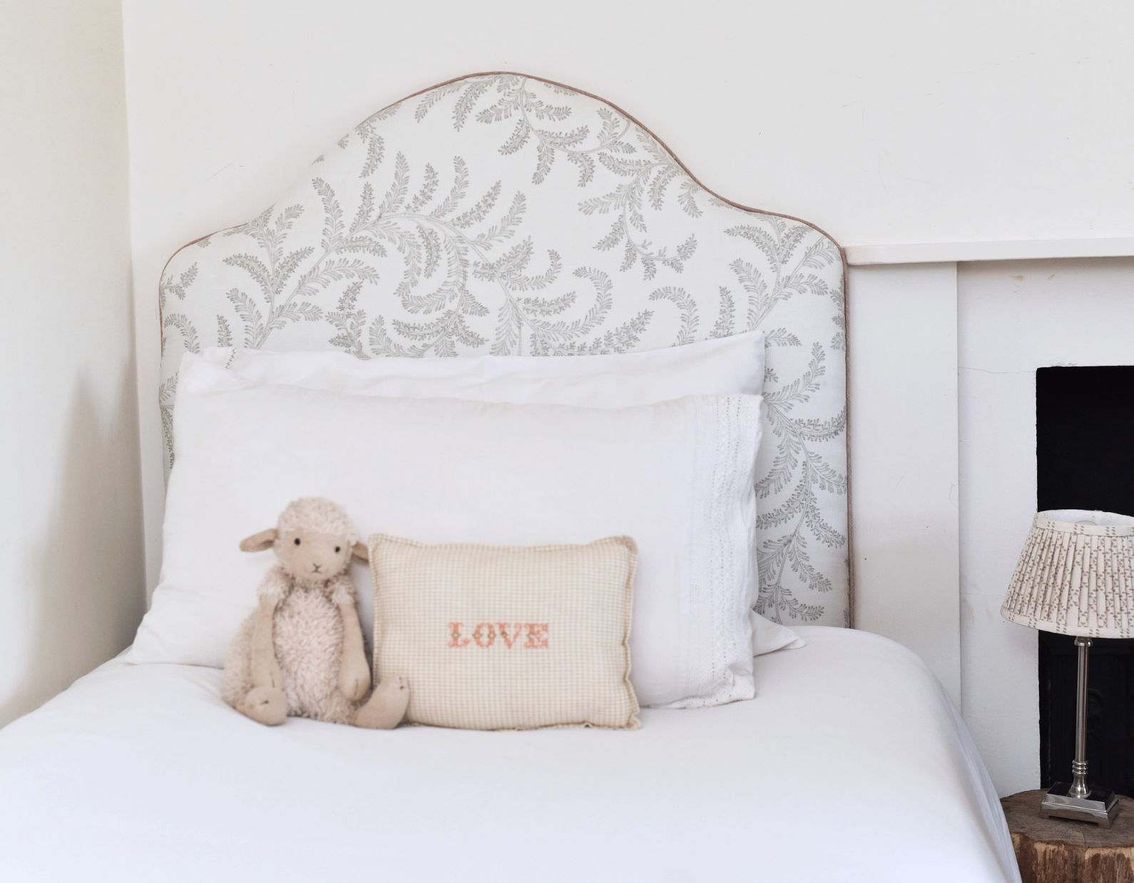 Headboard in Colefax & Fowler fabric